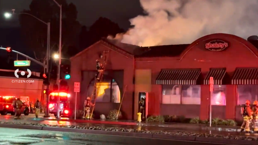 Firefighters respond to a blaze at a Shakey's restaurant in Pico Rivera on March 7, 2024.