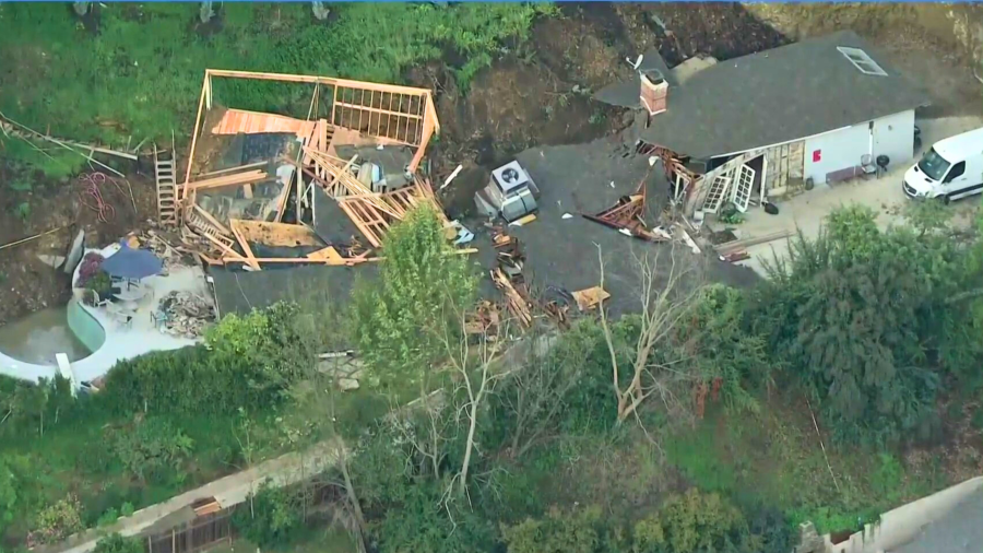 A home is red tagged after a mudslide in Sherman Oaks on March 13, 2024.