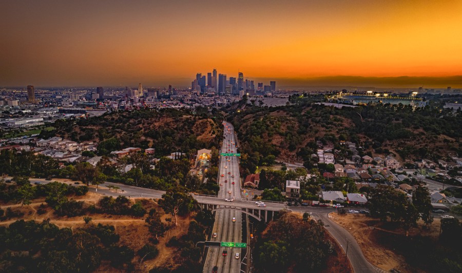 The downtown Los Angeles skyline at sunset.