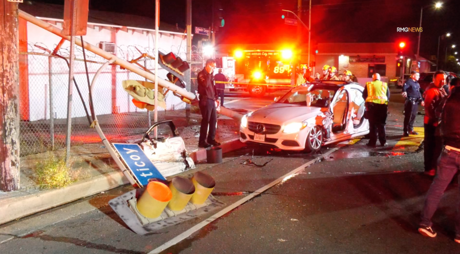 Mercedes driver blows through red light, slams into SUV