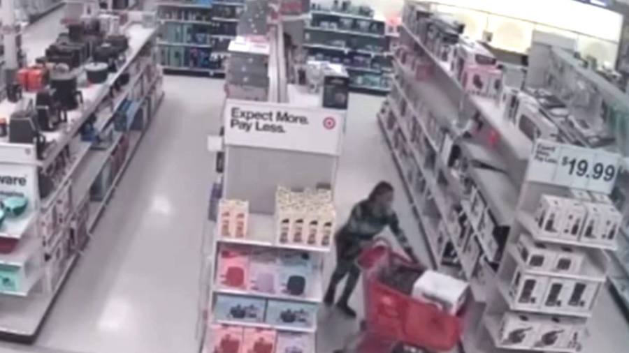 Security cameras captured a woman stealing a cart full of KitchenAid mixers at a Target store in Chino. (Chino Police Department)