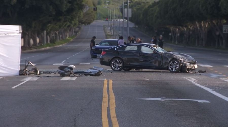 LAPD officers investigate after two people were killed following a multi-vehicle crash in Baldwin Hills on March 9, 2024. (KTLA)