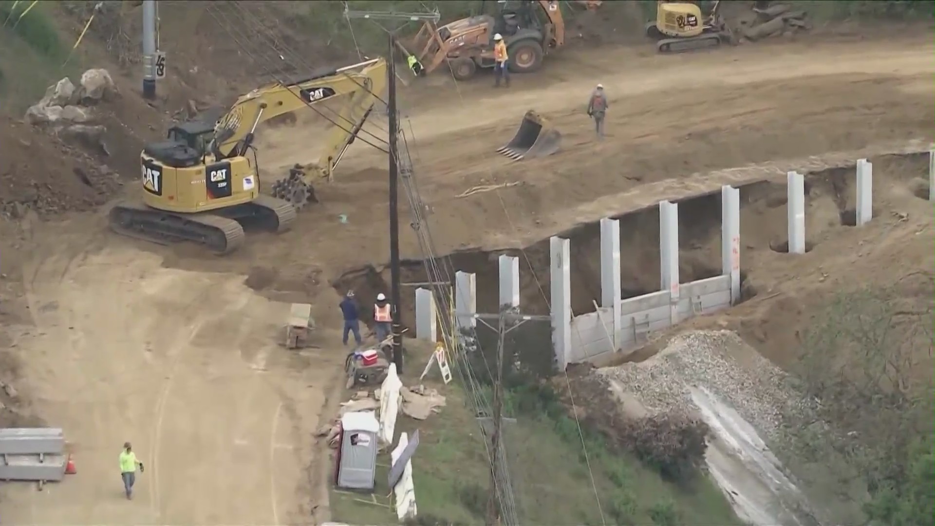 City of Los Angeles construction worked to shore up Mulholland Drive on March 29, 2024, before another round of storms make landfall in Southern California. (KTLA)