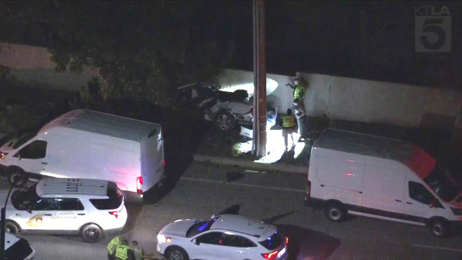 Investigators at the scene of a fatal single-vehicle accident in Rancho Cucamonga that left two teens dead on March 8, 2024. (KTLA)