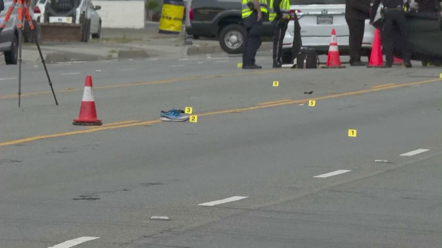 The victim's shoe is seen in the roadway after a driver with multiple DUI convictions struck and killed a pedestrian in Orange on March 12, 2024. (KTLA)