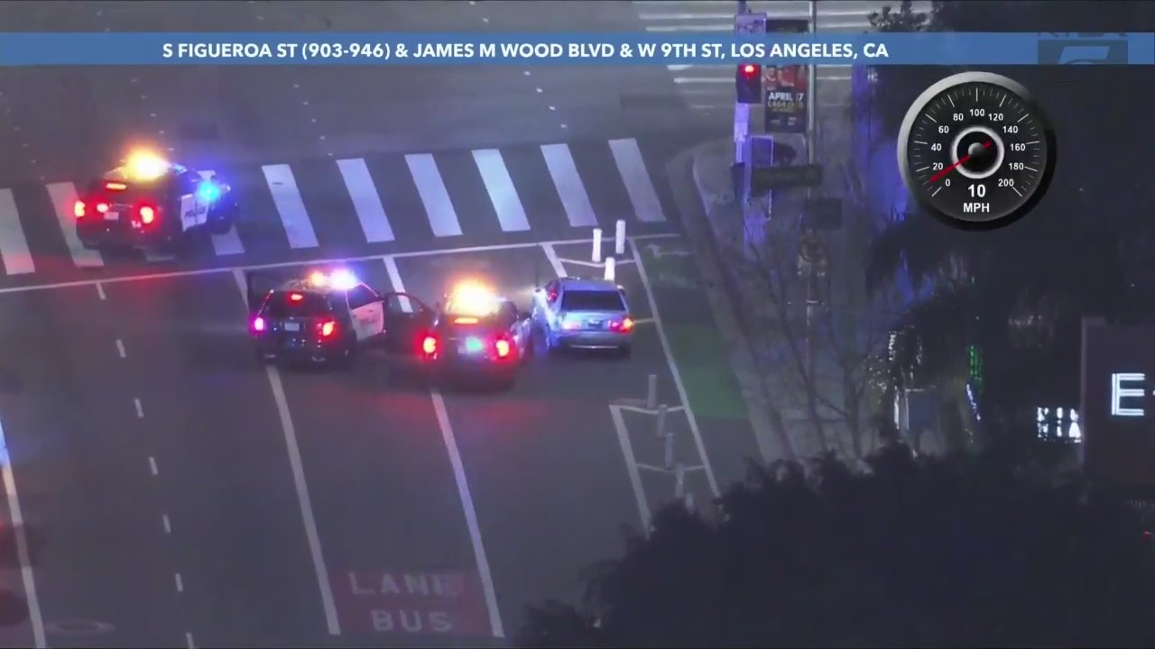 The suspect surrenders to police outside Crypto.com Arena in downtown Los Angeles on March 29, 2024. (KTLA)