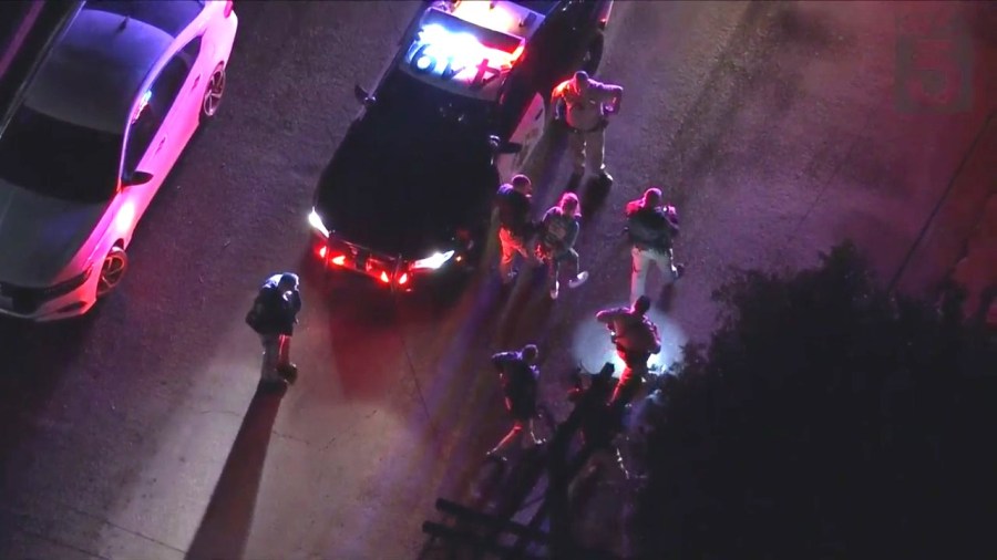 The female suspect surrendered to officers after a pursuit on March 7, 2024. (KTLA)