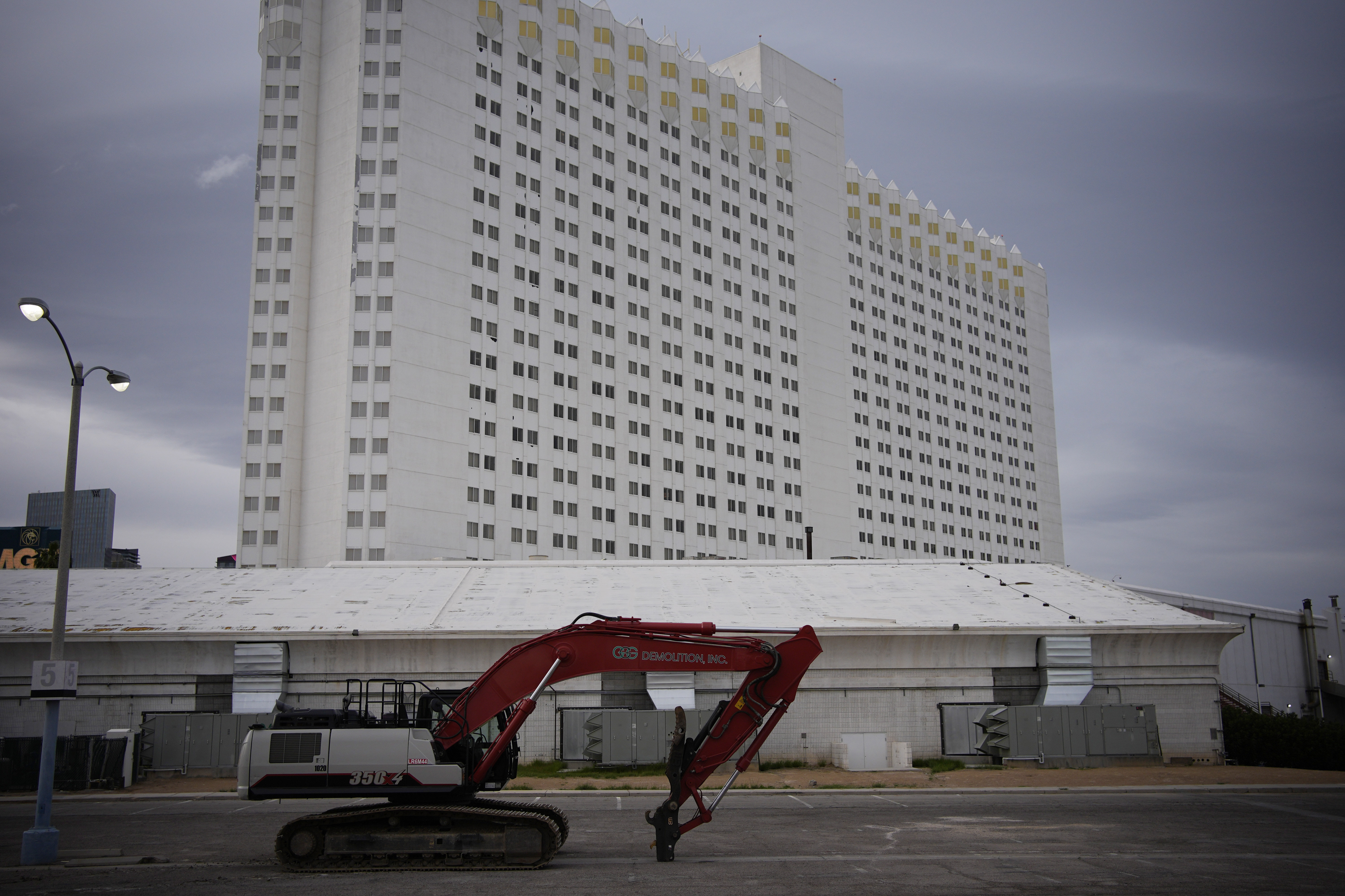Construction equipment is parked in back of the Tropicana hotel-casino Thursday, March 28, 2024, in Las Vegas. The casino, which is closing April 2, will be demolished to make room for a proposed baseball stadium. (AP Photo/John Locher)