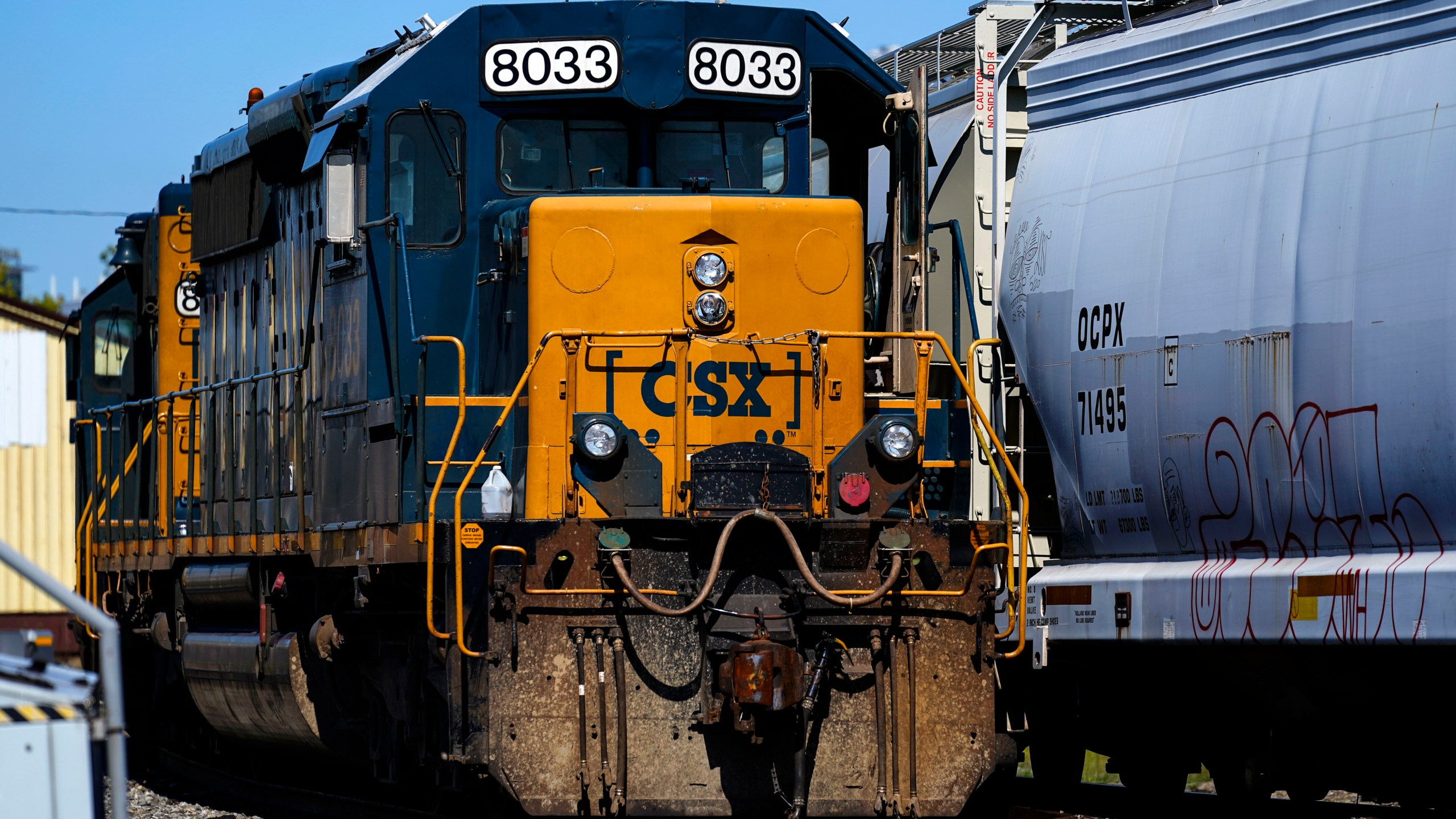 FILE - A CSX train engine sits idle on tracks in Philadelphia, Wednesday, Sept. 14, 2022. Major freight railroads will have to maintain two-person crews on most routes under a new federal rule that was finalized Tuesday, April 2, 2024. (AP Photo/Matt Rourke, File)