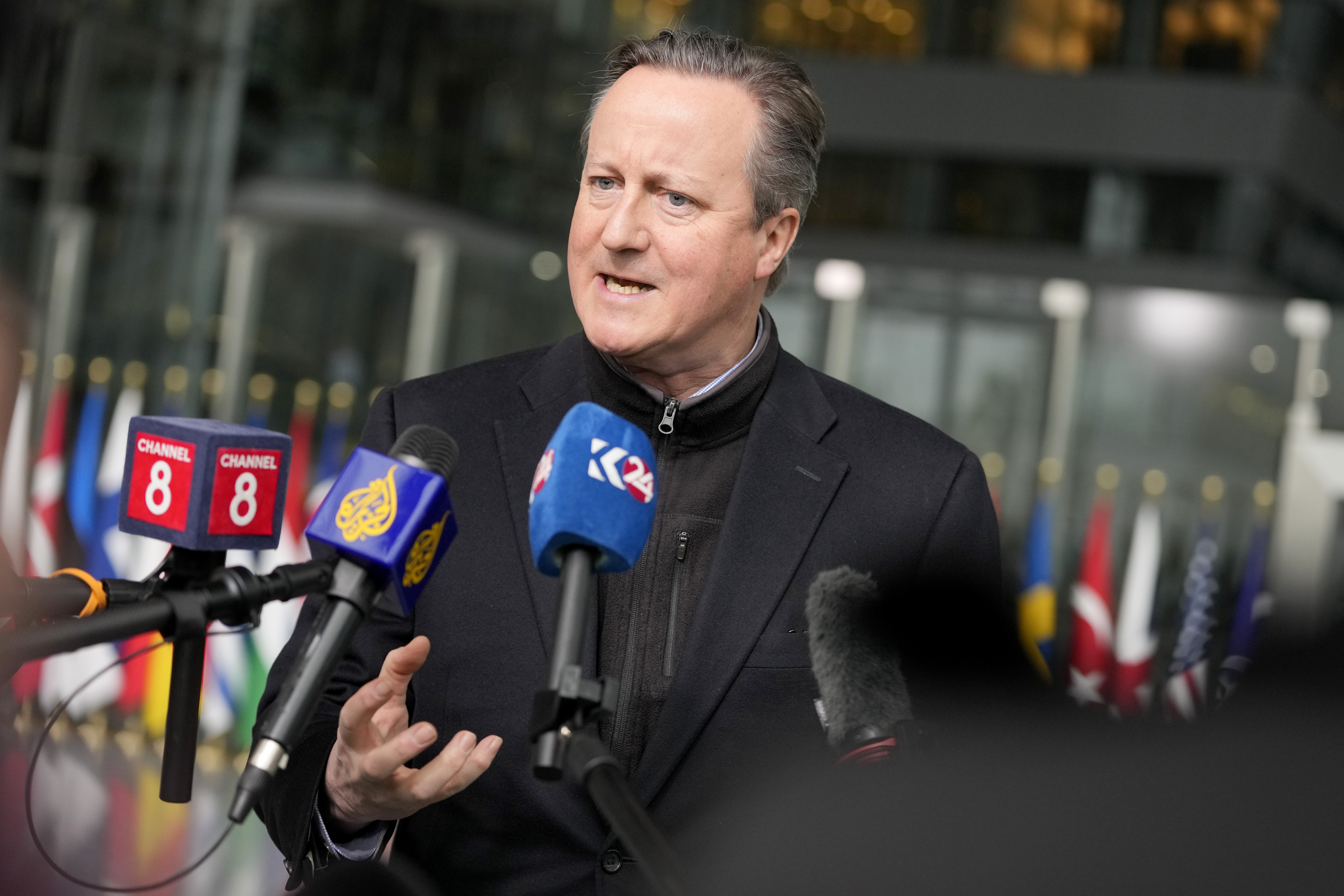 British Foreign Secretary David Cameron speaks with the media as he arrives for a meeting of NATO foreign ministers at NATO headquarters in Brussels, Wednesday, April 3, 2024. NATO foreign ministers gathered in Brussels on Wednesday to debate plans to provide more predictable, longer-term support to Ukraine. (AP Photo/Virginia Mayo)