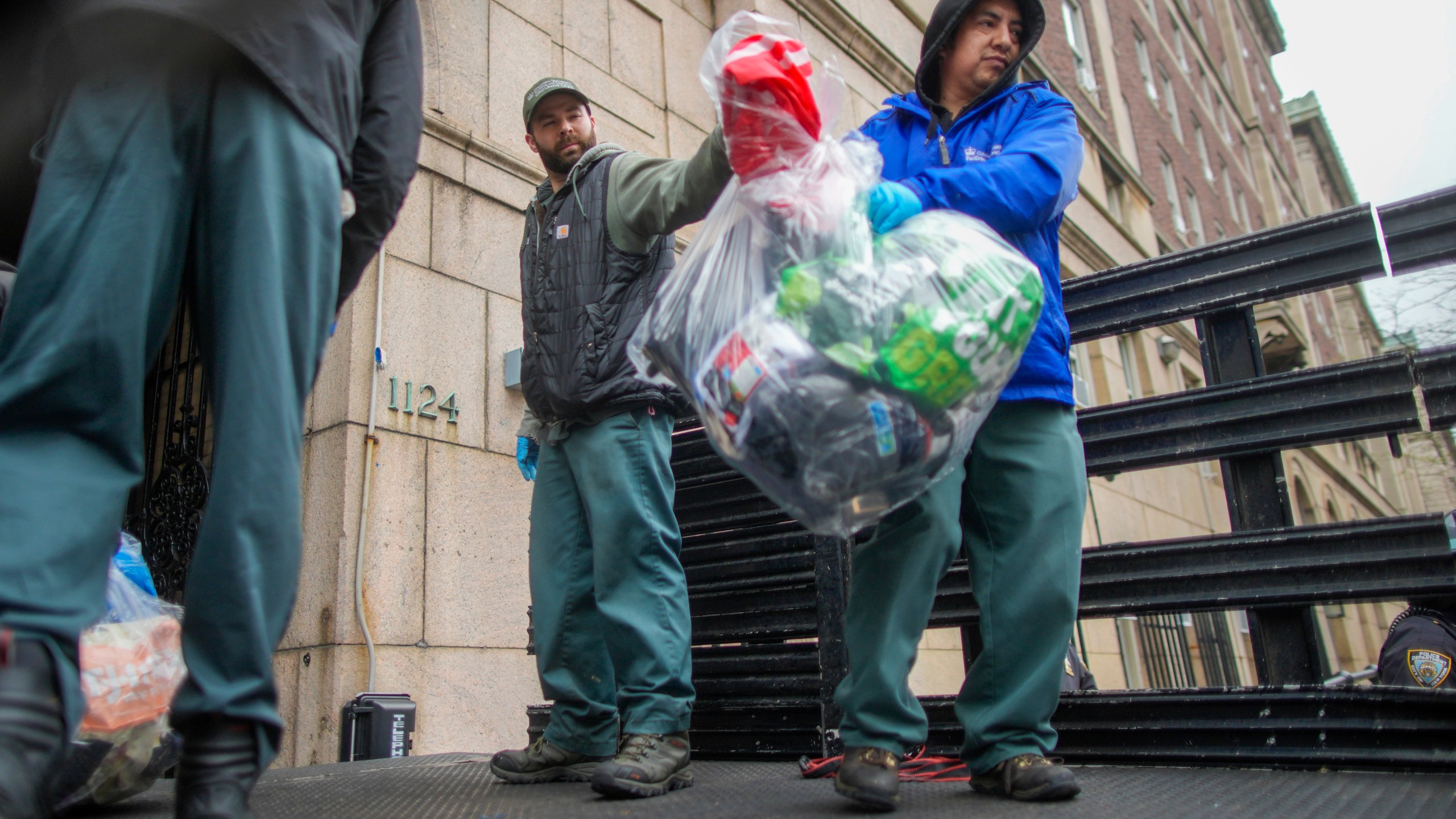 Men load a truck with the belongings of demonstrators who participated in an encampment on the Columbia University campus, Thursday, April 18, 2024, in New York. The protestors were calling for the school to divest from corporations they claim profit from the war in the Middle East. (AP Photo/Mary Altaffer)