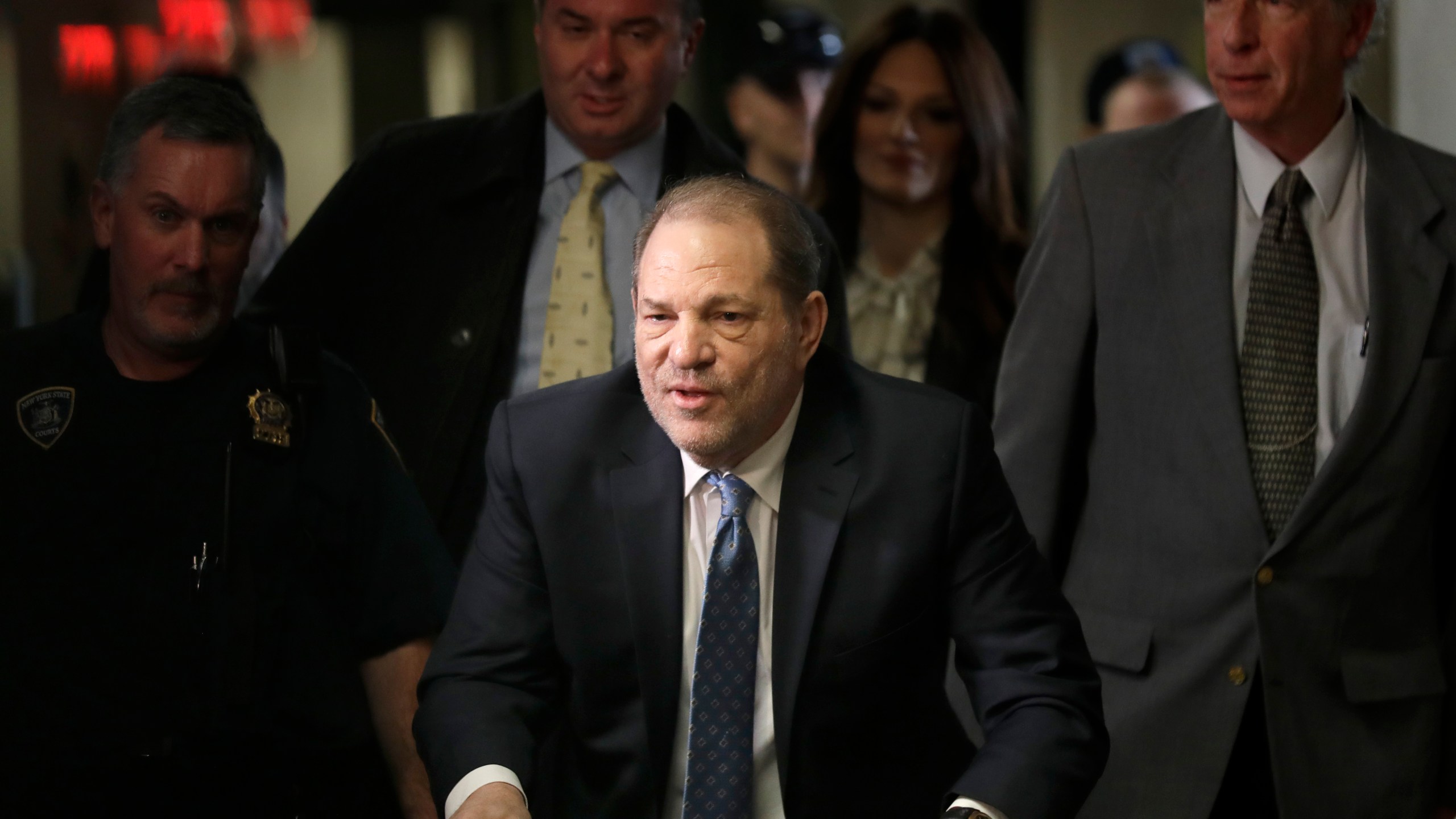 FILE - Harvey Weinstein arrives at a Manhattan courthouse for jury deliberations in his rape trial, Monday, Feb. 24, 2020, in New York. New York's highest court has overturned Harvey Weinstein's 2020 rape conviction and ordered a new trial. (AP Photo/Seth Wenig, File)