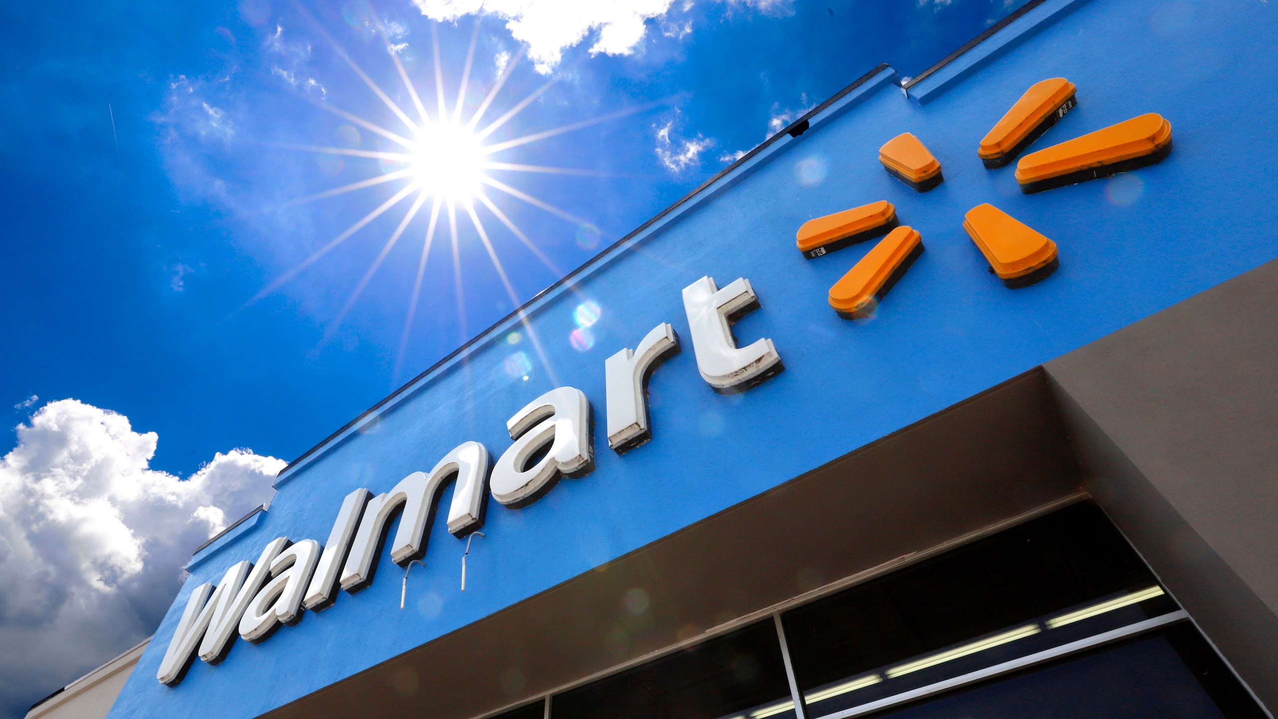 FILE - A Walmart sign is displayed over the entrance to a store, June 25, 2019, in Pittsburgh. Walmart said Tuesday, April 30, 2024, that it is launching its biggest store-label food brand in 20 years in terms of its breadth of items, as it seeks to appeal to younger customers who are not brand loyal and want chef-inspired foods that are more affordably priced. (AP Photo/Gene J. Puskar, File)