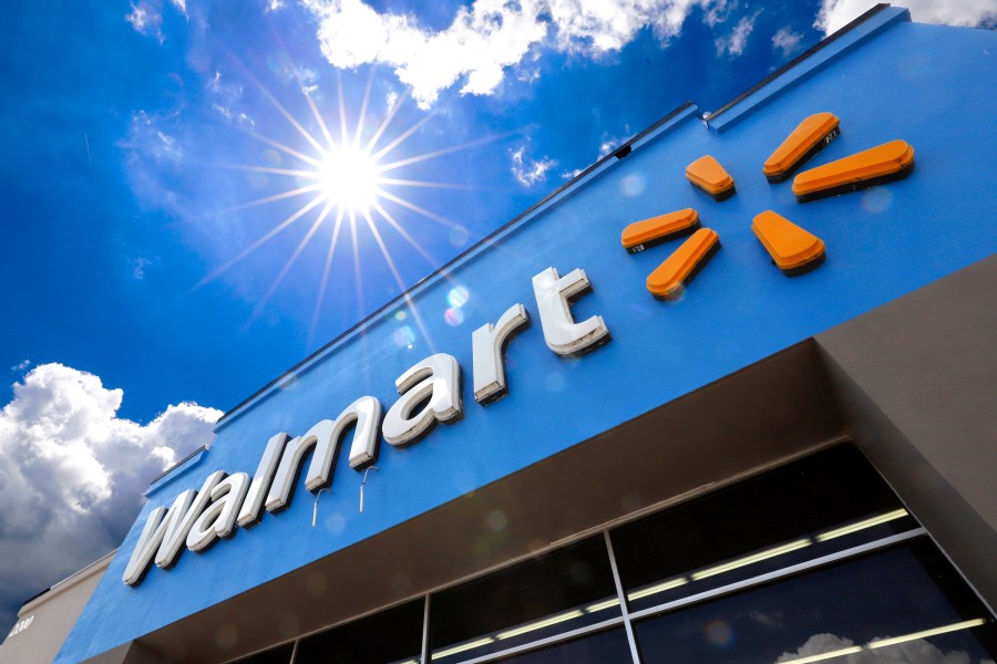 FILE - A Walmart sign is displayed over the entrance to a store, June 25, 2019, in Pittsburgh. Walmart said Tuesday, April 30, 2024, that it is launching its biggest store-label food brand in 20 years in terms of its breadth of items, as it seeks to appeal to younger customers who are not brand loyal and want chef-inspired foods that are more affordably priced. (AP Photo/Gene J. Puskar, File)