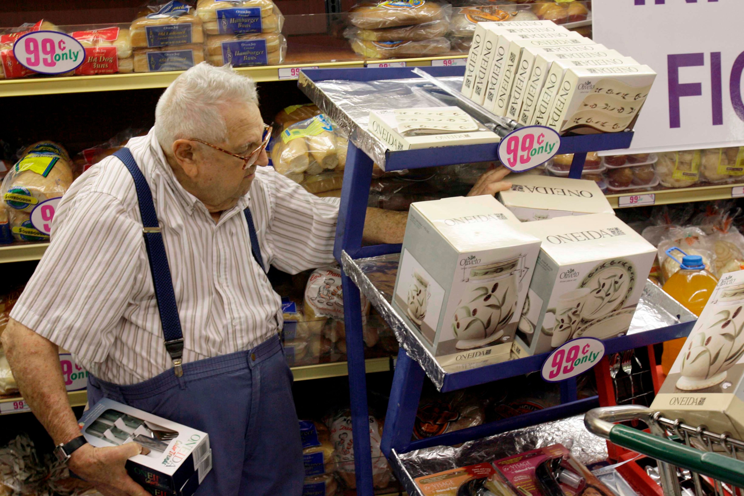 Don Ostrov, 84, from Beverly Hills, Calif., shops at a 99 Cents Only Store in Los Angeles Monday, Sept 8, 2008. Discounter 99 Cents Only Stores Inc. said Monday it will raise prices, including increasing its top price, to "99.99" cents, or nearly a dollar. (AP Photo/Nick Ut)