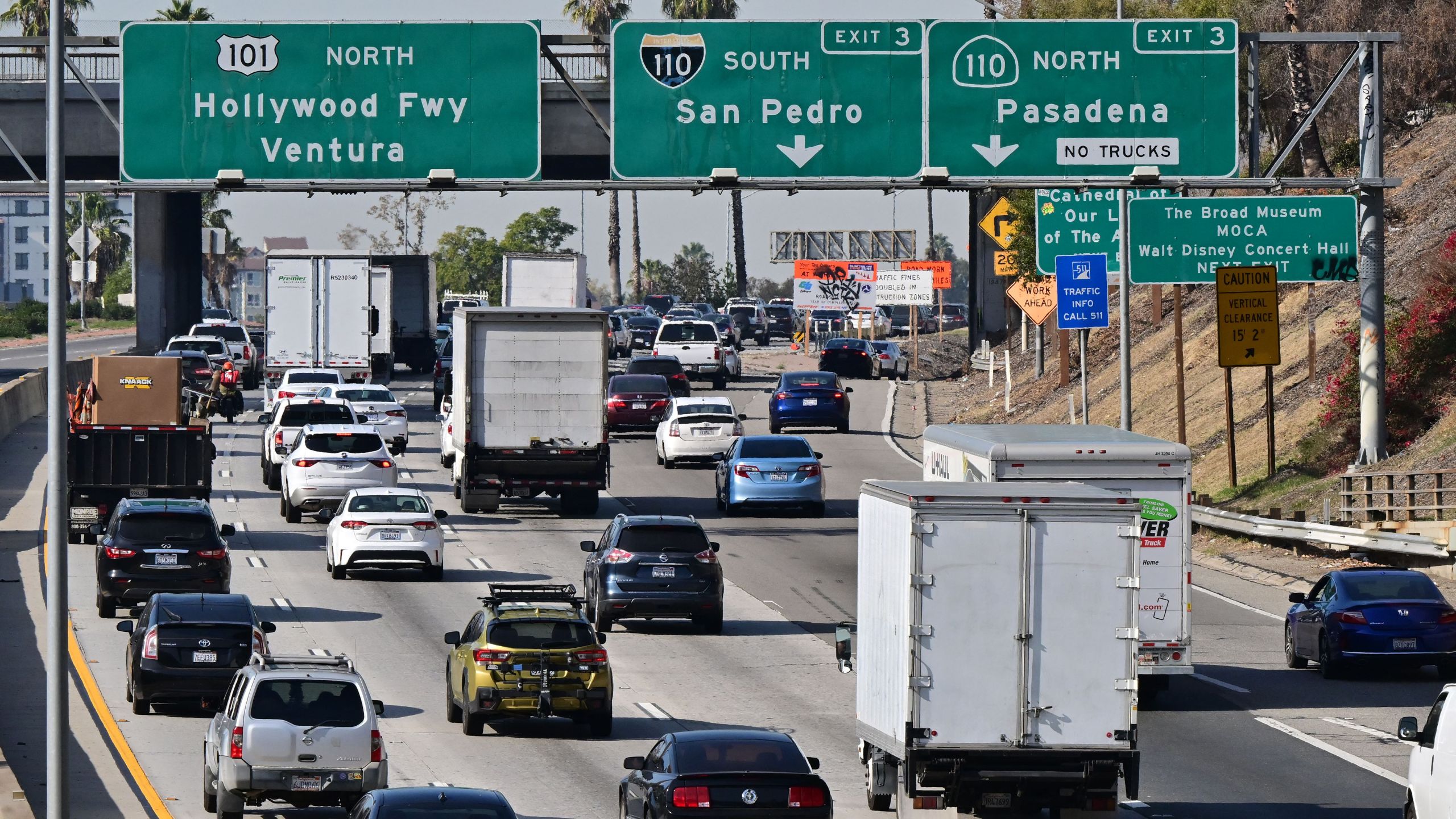 Motorists in freeway traffic head north out of downtown Los Angeles, California. (Photo by FREDERIC J. BROWN/AFP via Getty Images)