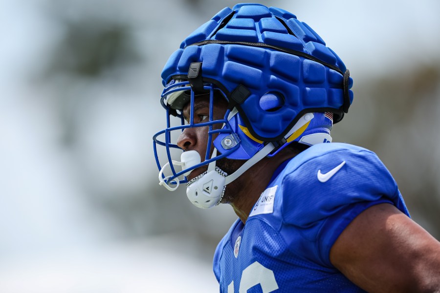 Jared Pinkney of the Los Angeles Rams participates in a drill while wearing a Guardian Cap during training camp at University of California Irvine on July 29, 2022 in Irvine, California. (Getty Images)