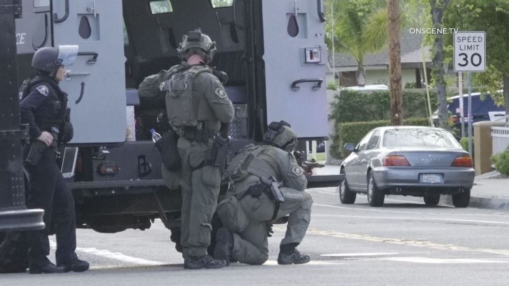 SWAT Team members surrounded an Anaheim senior apartment complex after a woman was shot to death on April 25, 2024. (OnScene.TV)