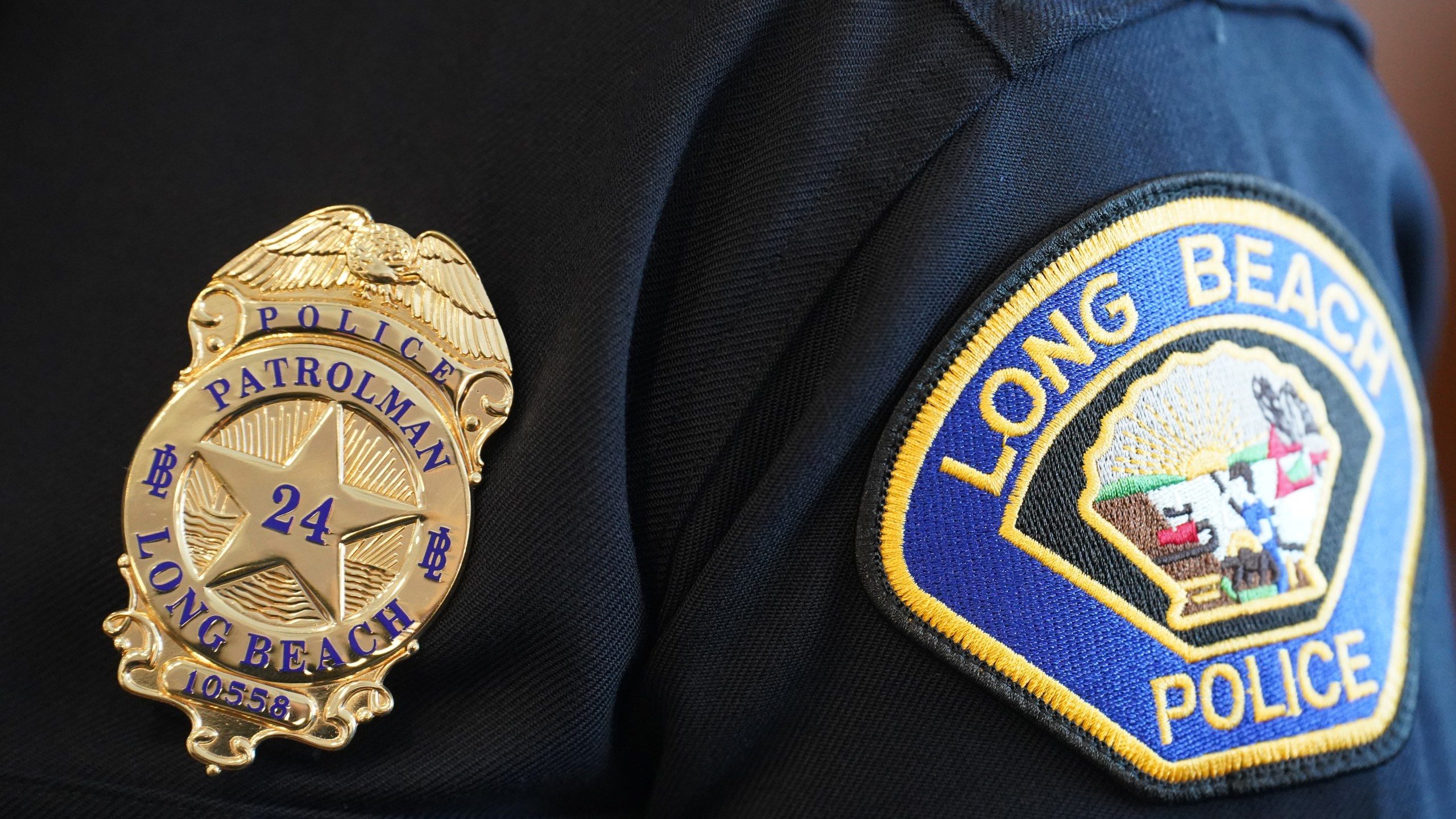 FILE - A Long Beach Police Department 'centennial badge' and patch are shown in this undated image. (Long Beach Police Department)