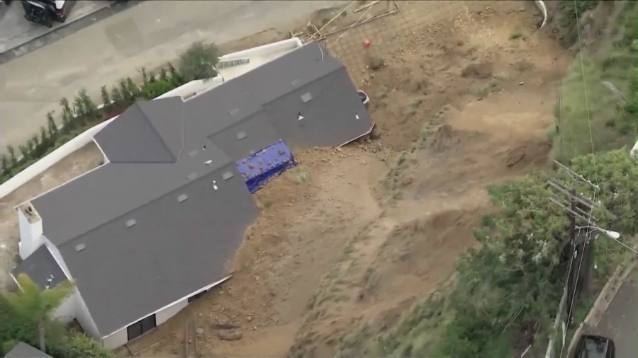 A Hollywood Hills home was partially buried by a large landslide on April 4, 2024. (KTLA)