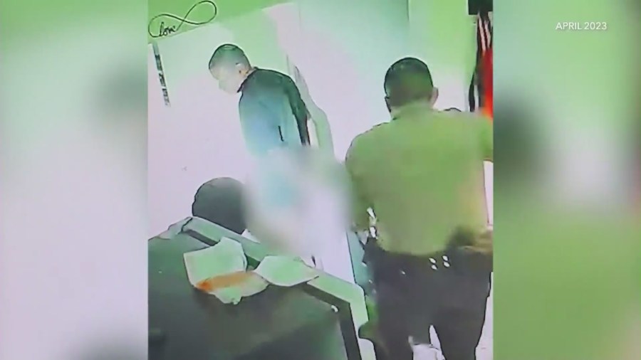 L.A. County Sheriff's deputies seen on home surveillance video wrongfully detaining Derrick Cooper at gunpoint on April 18, 2023. (Derrick Cooper)