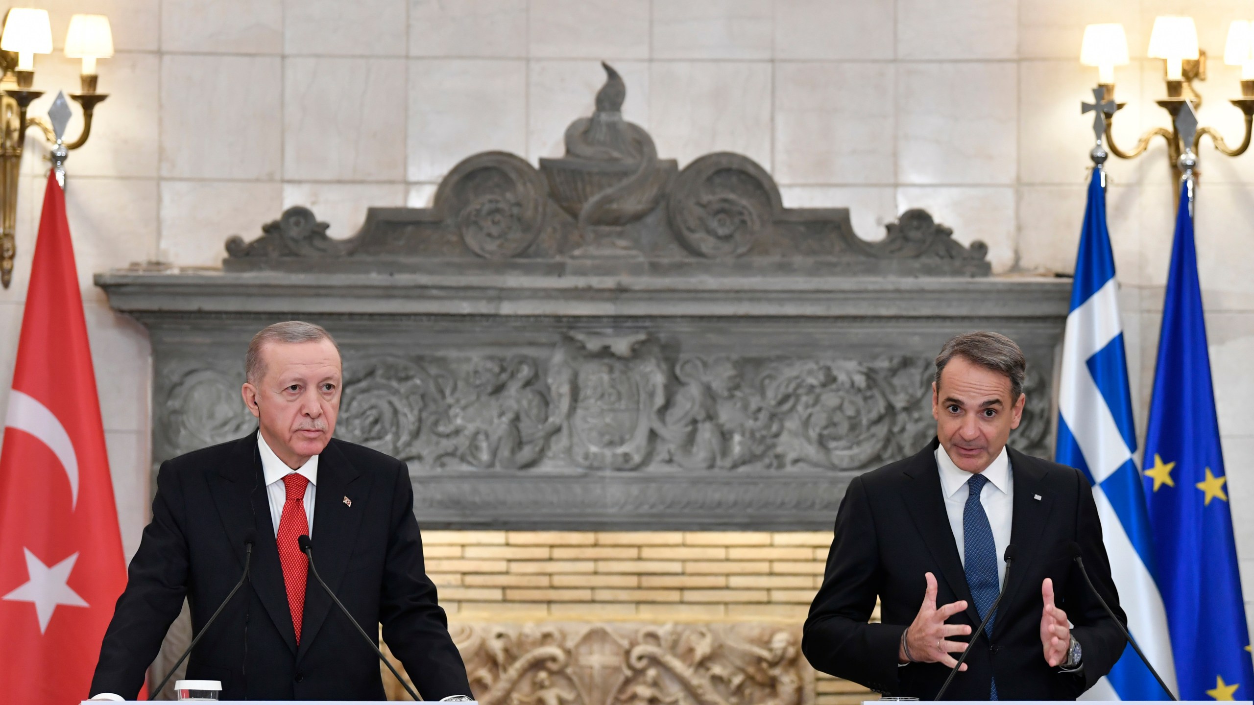 FILE - Greece's Prime Minister Kyriakos Mitsotakis, right, makes statements with Turkey's President Recep Tayyip Erdogan after their meeting at Maximos Mansion in Athens, Greece, Thursday, Dec. 7, 2023. Old foes Turkey and Greece will test a five-month-old friendship initiative on Monday, May 13, 2024 when Greek Prime Minister Kyriakos Mitsotakis visits Ankara. (AP Photo/Michael Varaklas, File)