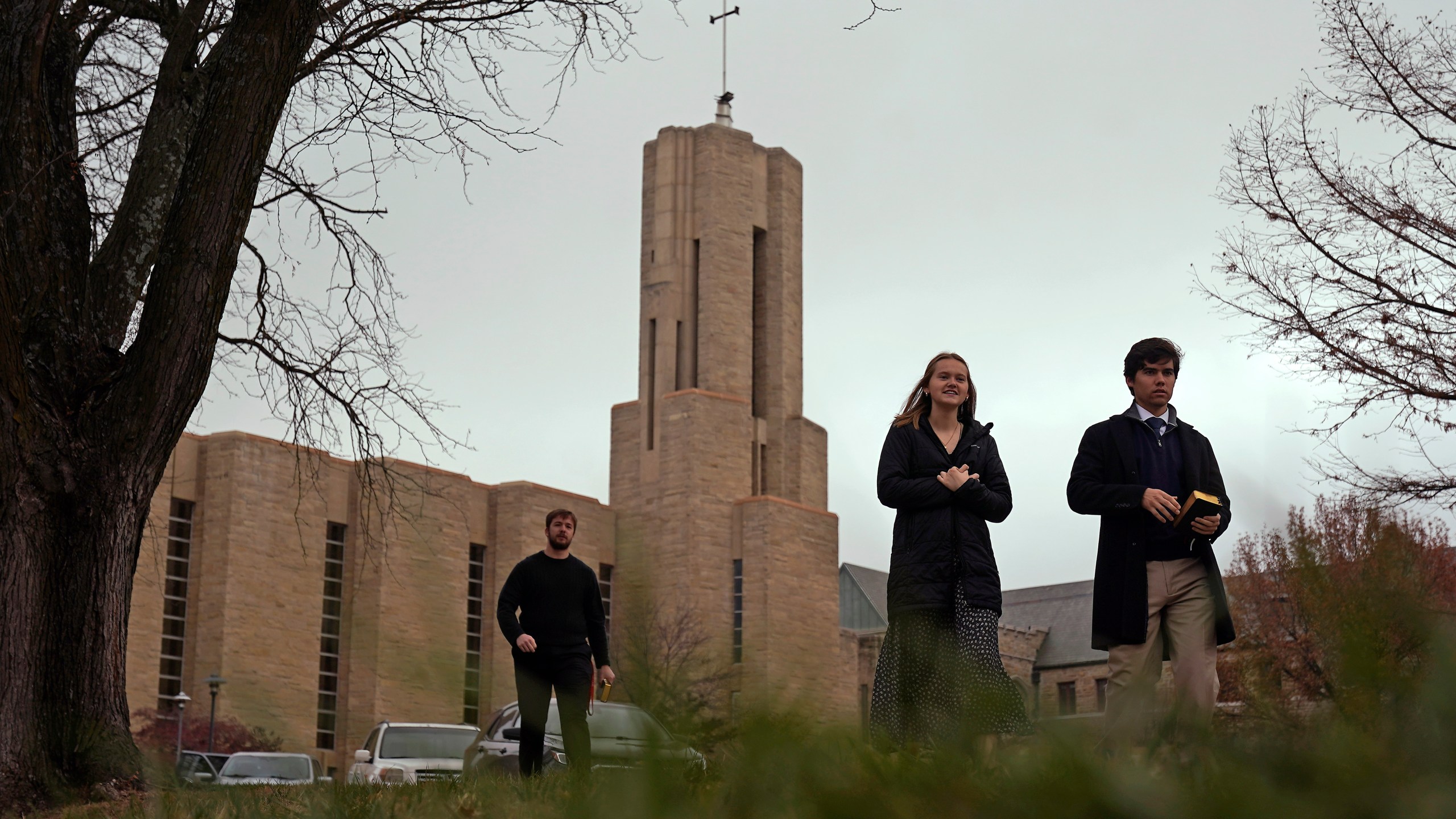 Students leave after attending a Catholic Mass at Benedictine College Sunday, Dec. 3, 2023, in Atchison, Kan. Students told The Associated Press in interviews they embrace the college's emphasis on Catholic teaching and practice. (AP Photo/Charlie Riedel)