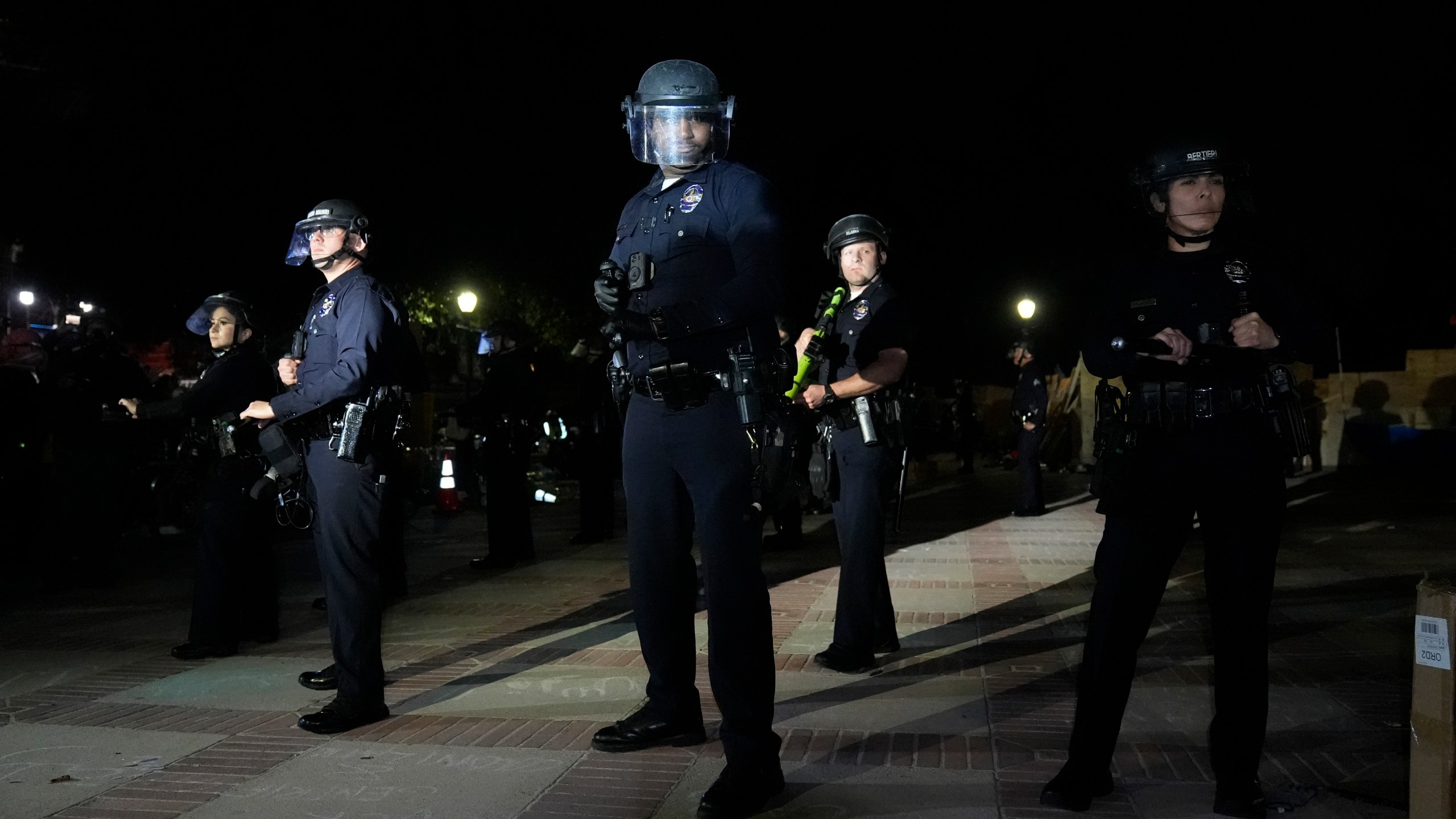 Police prepare to enter an encampment occupied by pro-Palestinian demonstrators on the UCLA campus Thursday, May 2, 2024, in Los Angeles. (AP Photo/Jae C. Hong)