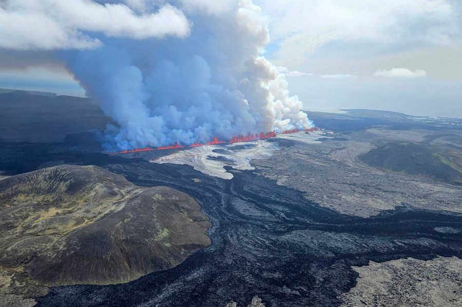 A volcano erupts in Grindavik, Iceland, Wednesday, May 29, 204. Wednesday, May 29, 2024. A volcano in southwestern Iceland is erupting, spewing red streams of lava in its latest display of nature’s power. A series of earthquakes before the eruption Wednesday triggered the evacuation of the popular Blue Lagoon geothermal spa. The eruption began in the early afternoon north of Grindavik, a coastal town of 3,800 people that was also evacuated. (Birn Oddsson/Iceland Civil Defense via AP)