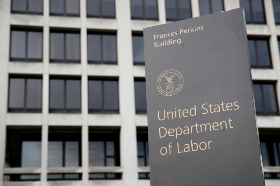 FILE - A sign stands outside the U.S. Department of Labor's headquarters, May 6, 2020, in Washington. The U.S. Department of Labor is asking a federal court to prevent Hyundai and two other Alabama companies from employing children illegally. (AP Photo/Patrick Semansky, File)