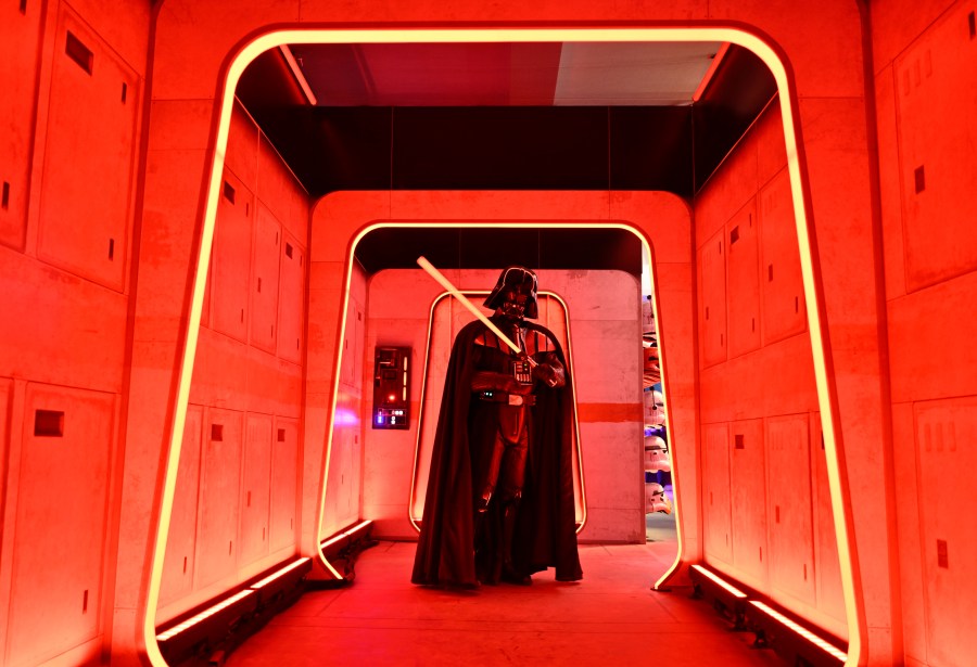 A Darth Vader costumed character poses at the Hasbro and Amazon Star Wars interactive Imperial March experience at the Empire State Building on Thursday, March 21, 2024, in New York. (Photo by Evan Agostini/Invision/AP)