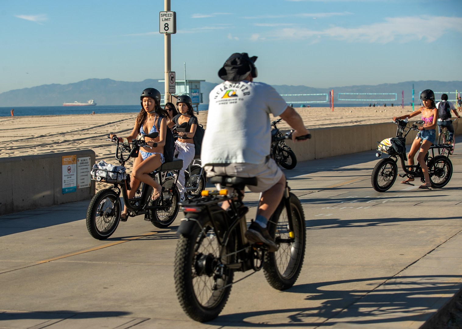 HERMOSA BEACH, CA-NOVEMBER 10, 2023, 2023:People ride their e-bikes on the Strand in Hermosa Beach. In Hermosa Beach, it's against city code to use electric power on the Strand, but many e-bike riders do so anyway. (Mel Melcon / Los Angeles Times via Getty Images)