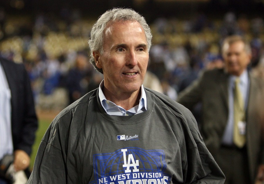 Frank McCourt celebrates after the Dodgers won the National League West against the Colorado Rockies on October 3, 2009 in Los Angeles. (Getty Images)