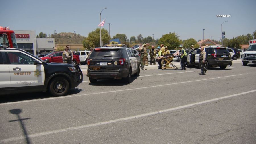 Paramedics arrived on scene after a violent rollover crash involving an L.A. County sheriff's deputy in Santa Clarita on May 29, 2024. (KNN)