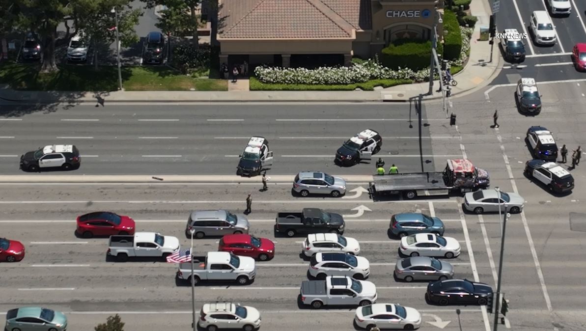 Paramedics arrived on scene after a violent rollover crash involving an L.A. County sheriff's deputy in Santa Clarita on May 29, 2024. (KNN)