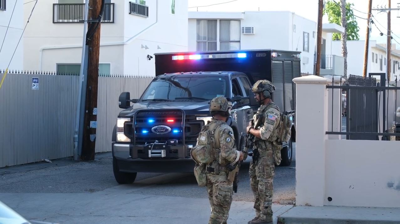 Truckloads of SWAT Team members surrounded a Canoga Park neighborhood on May 7, 2024. (TNLA)