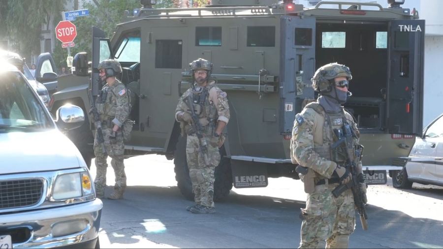 Truckloads of SWAT Team members surrounded a Canoga Park neighborhood on May 7, 2024. (TNLA)