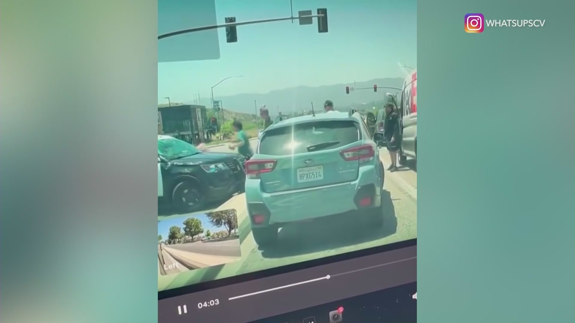 Bystanders running to help the L.A. County sheriff's deputy after a violent rollover crash in Santa Clarita on May 29, 2024. (@whatsupscv)