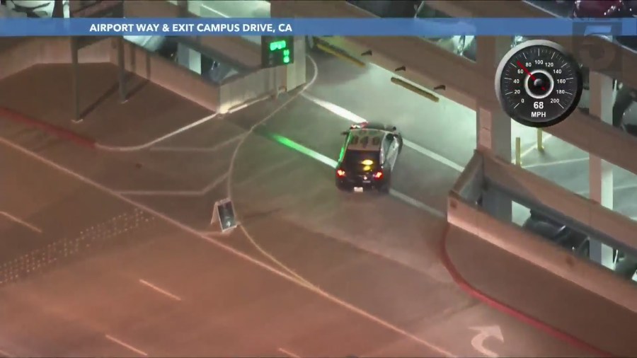 Patrol units enter a parking garage after a pursuit suspect drove to the John Wayne Airport in Santa Ana on May 24, 2024. (KTLA)