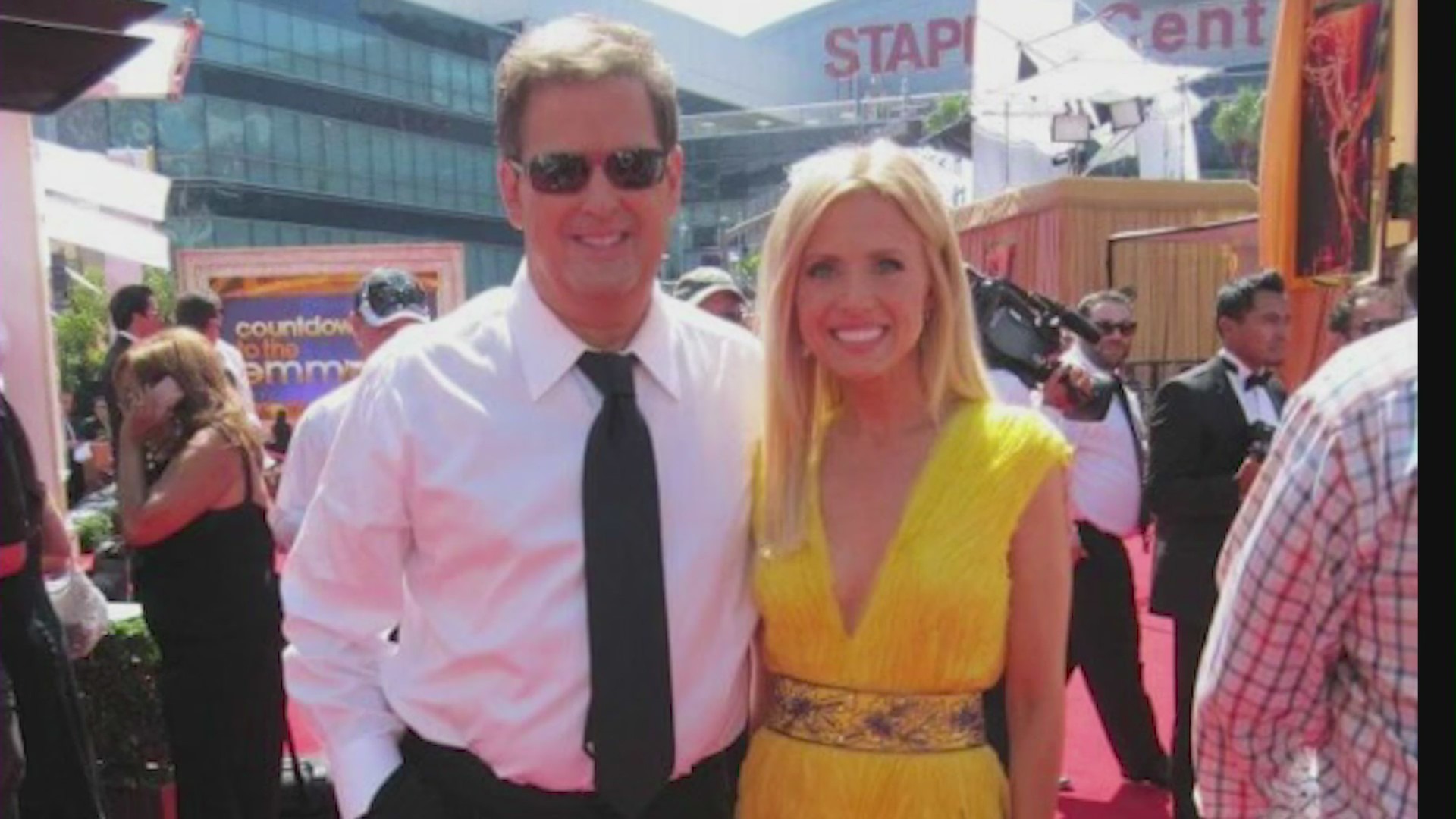 Jessica Holmes and Sam Rubin reporting from the red carpet. (KTLA)