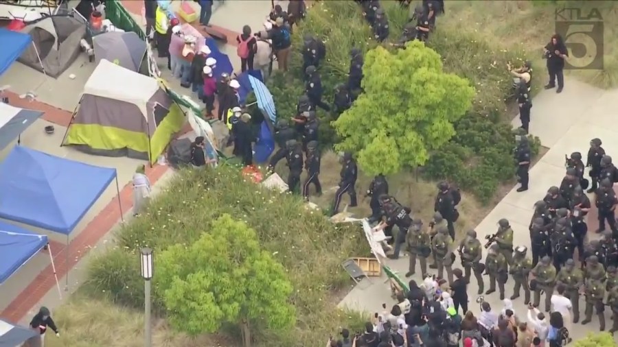 Officers began dismantling a pro-Palestinian encampment at UC Irvine on May 15, 2024. (KTLA)