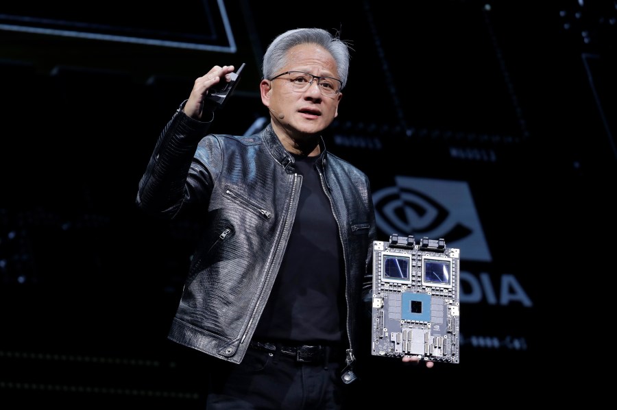 FILE - President and CEO of Nvidia Corporation Jensen Huang delivers a speech during the Computex 2024 exhibition in Taipei, Taiwan, June 2, 2024. A rebound for Nvidia on Tuesday, June 25, 2024, is helping keep U.S. indexes close to their records Tuesday. (AP Photo/Chiang Ying-ying)