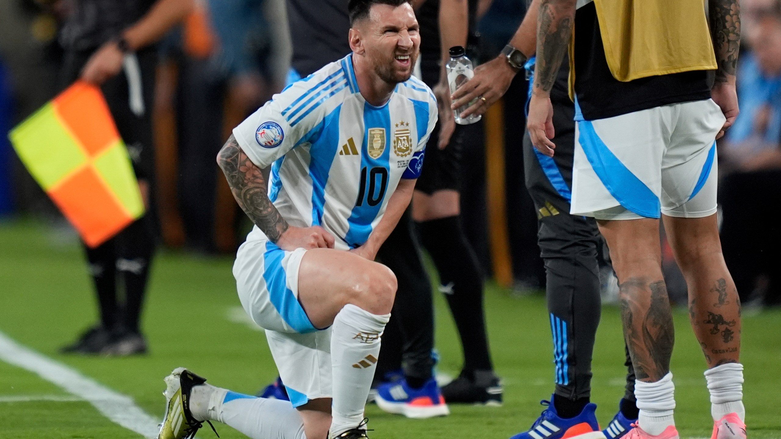 Argentina's Lionel Messi grimaces during a Copa America Group A soccer match against Chile in East Rutherford, N.J., Tuesday, June 25, 2024. (AP Photo/Julia Nikhinson)