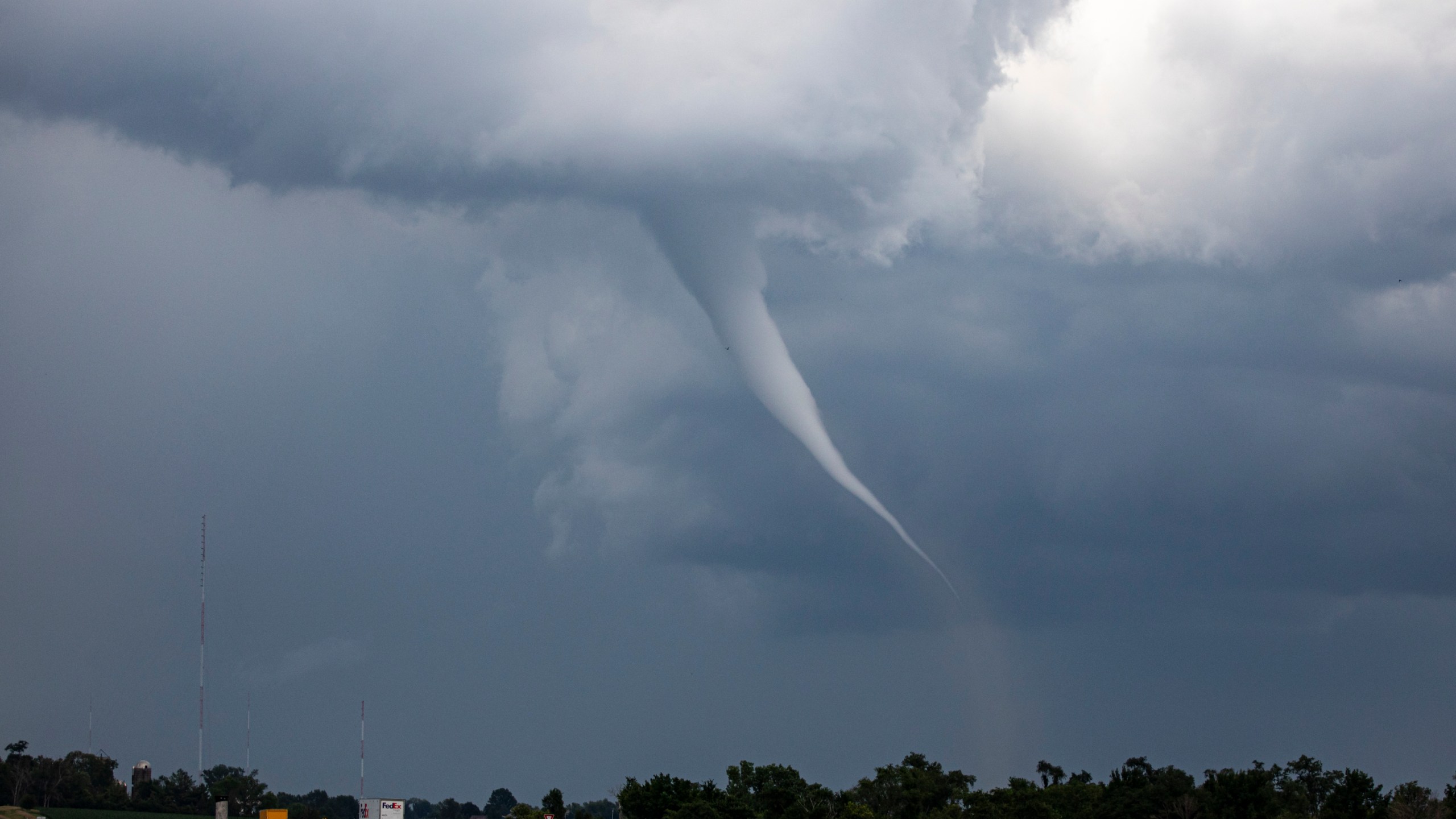A tornado is seen near Cedar Rapids, Iowa on Tuesday, June 25, 2024. More severe weather was forecast to move into the region Tuesday, potentially bringing large hail, damaging winds and even a brief tornado or two in parts of western Iowa and eastern Nebraska, according to the National Weather Service. (Nick Rohlman/The Gazette via AP)