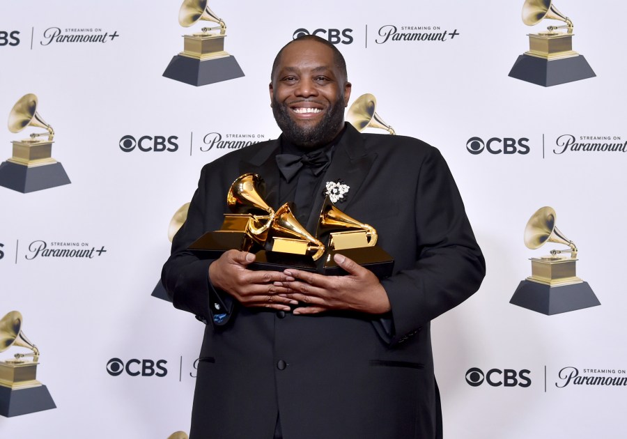 FILE - Killer Mike poses in the press room with the awards for best rap performance and best rap song for "Scientists & Engineers," and best rap album for "Michael" during the 66th annual Grammy Awards on Sunday, Feb. 4, 2024, in Los Angeles. Killer Mike is expected to avoid charges over a physical altercation that led to his arrest at the Grammys earlier this year after the rapper recently completed community service. (Photo by Richard Shotwell/Invision/AP)