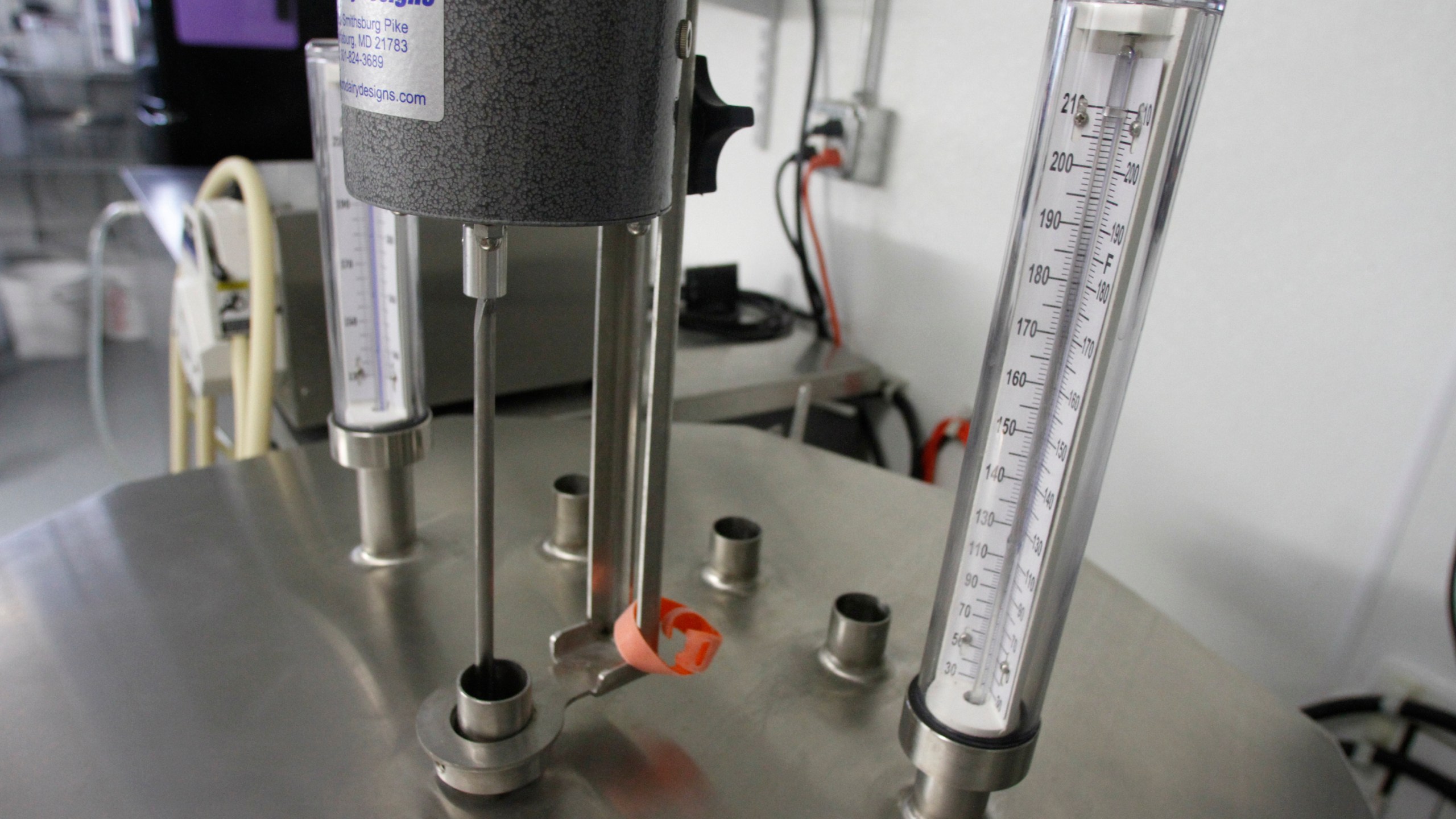 FILE - Thermometers are seen atop a small-scale pasteurizer in Plainfield, Vt., on March 13, 2012. On Friday, June 28, 2024, U.S. officials said a new study provides reassurance that pasteurization kills bird flu virus in cow's milk. (AP Photo/Toby Talbot)