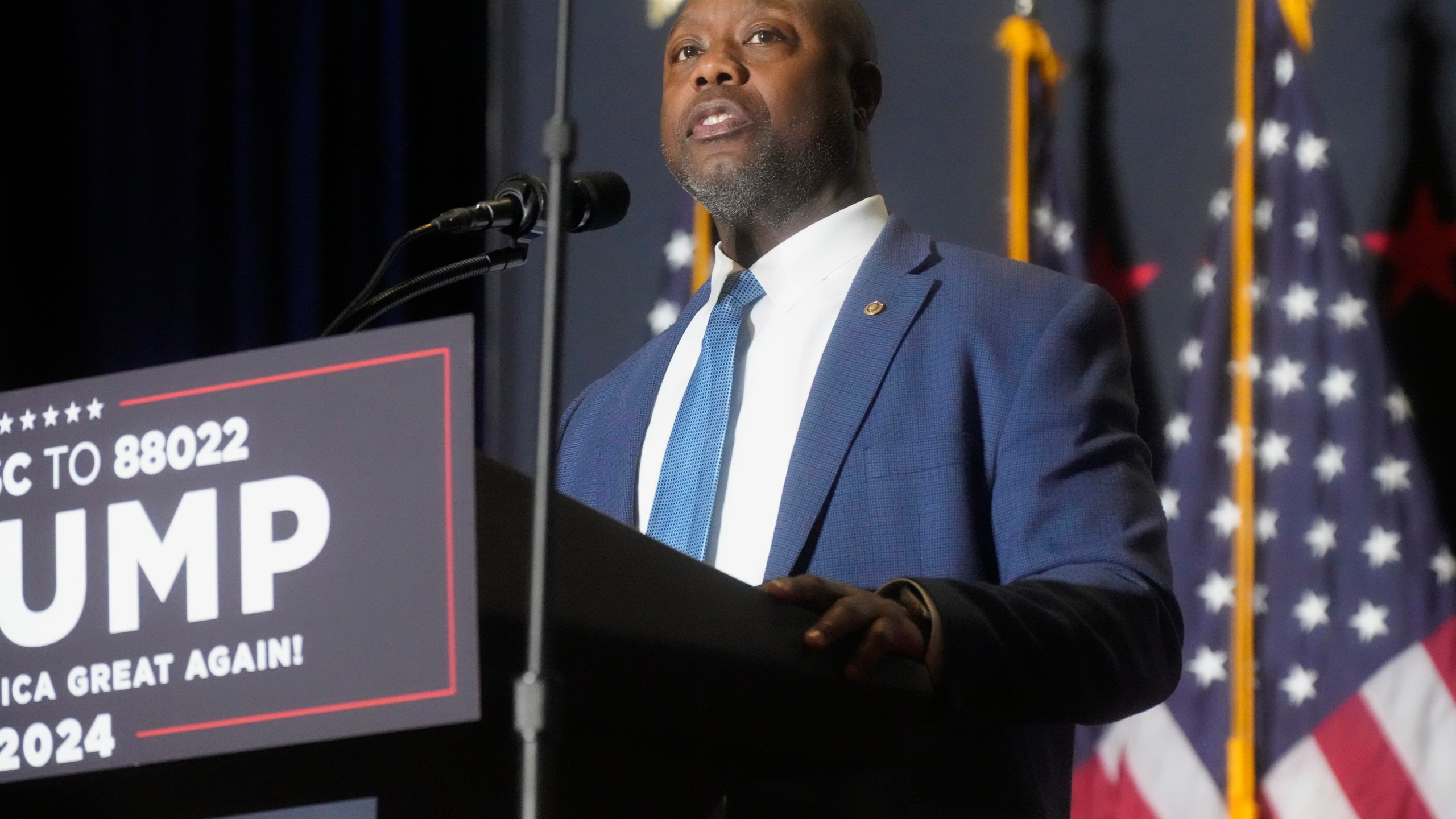 FILE - Sen. Tim Scott, R-S.C., speaks at a campaign rally, Feb. 14, 2024, in North Charleston, S.C. In some cases, Donald Trump's potential vice presidential contenders have had to abandon long-held policy positions and recant vehement criticism. In 2016, Scott excoriated Trump for his reluctance to condemn the Ku Klux Klan, his attacks on a judge's Mexican heritage, and comments equivocating about the 2017 white nationalist rally in Charlottesville, Virginia. (AP Photo/Meg Kinnard, File)