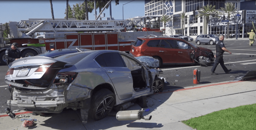 Wrong-way Tesla driver flips into oncoming O.C. traffic