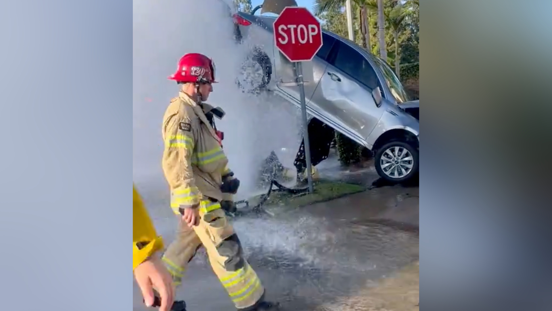 Crash in SoCal leaves car suspended by gushing water