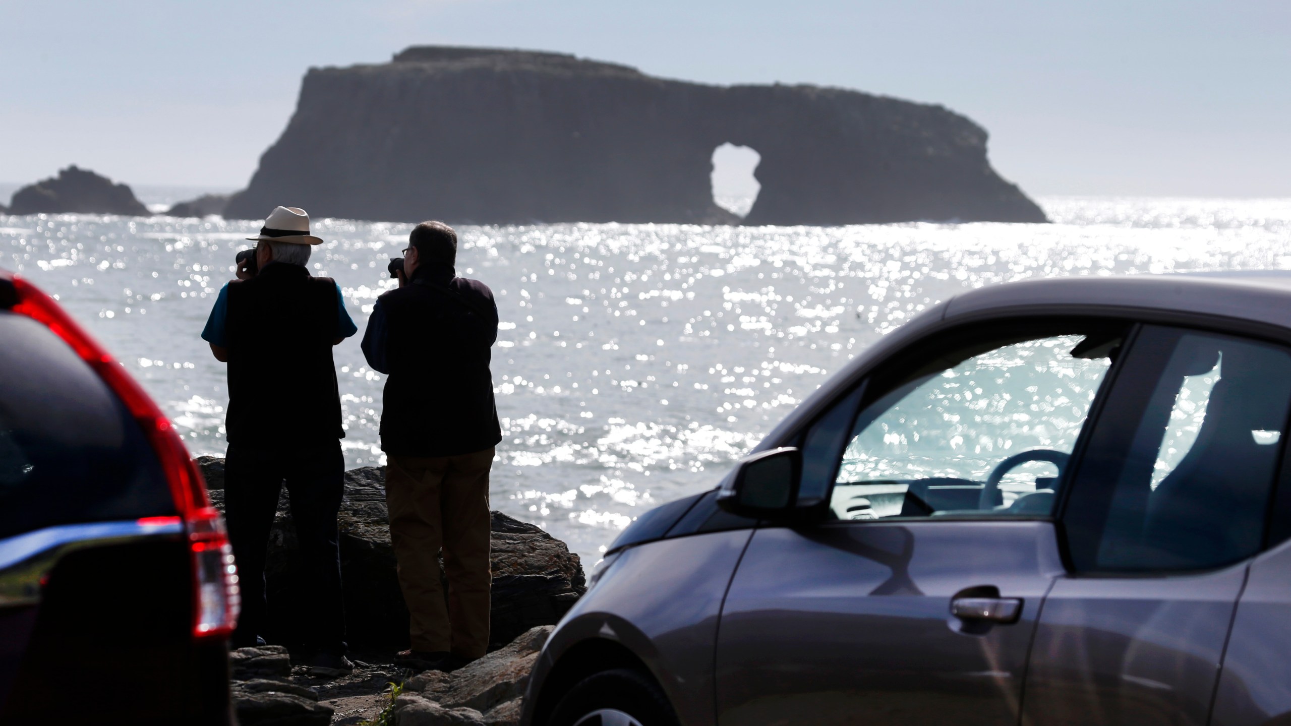 Visitors photograph Arched Rock from the Goat Rock parking lot at Sonoma Coast State Park in Bodega Bay, Calif. on Saturday, Feb. 6, 2016. (Photo By Paul Chinn/The San Francisco Chronicle via Getty Images)